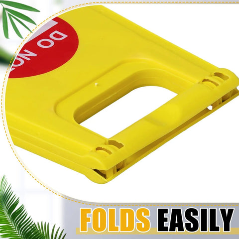 Close-up of Two Pack Double Sided Closed For Cleaning Floor Signs Bright Yellow Folding Warning Plaques handle and fold design.