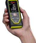 Hand holding Disto X1 Laser Distance Meter With 330 Ft Range, Bluetooth 4.2 And NFC Data Transfer To Disto Plan App, Add And Subtract Measurements For Pros, 4 Line Display, IP65 Dust And Waterjet Protection, 6 Ft Drop Tested, Includes Hand Loop And Pouch.
