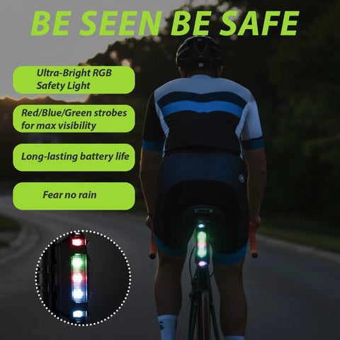 Cyclist on road bike showing waterproof tail light from 6 Piece Bike Accessories Kit For Men And Women Including Cycling Bag Bicycle Bag Gloves Waterproof Tail Light Ride Ready Mountain Road Gear And A Touch Screen Phone Holder With Responsive Window glowing in dark surroundings.