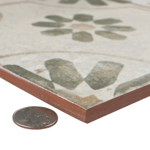 Blume Sage Ceramic Floor And Wall Tile 17.63 In Square Glazed with Subtle Texture shown with coin for scale