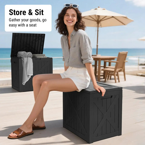 Woman seated on 31 Gallon Barn Style Outdoor Deck Box Waterproof Storage Chest With Lockable Lid Built Tough Weatherproof UV Resistant Resin Bin For Patio Cushions Pool Supplies Garden Tools Black by the beach.