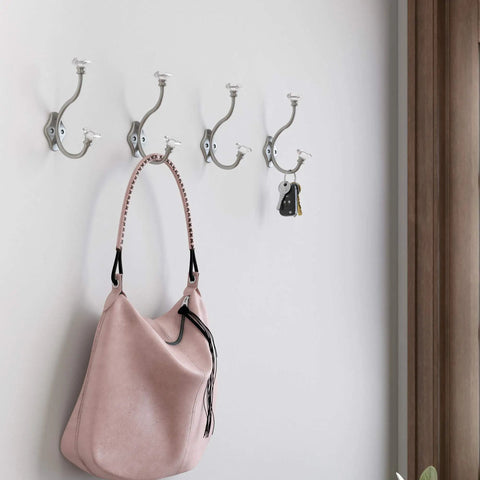 Acrylic Facets Design Coat And Hat Hook In Satin Nickel And Clear Finish, wall-mounted in hallway with bag and keys.
