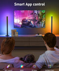 Family enjoying TV with Dope RGB LED Light Bar for TV and PC Backlighting with Bluetooth App Control and Music Sync, showing multicolor scene.