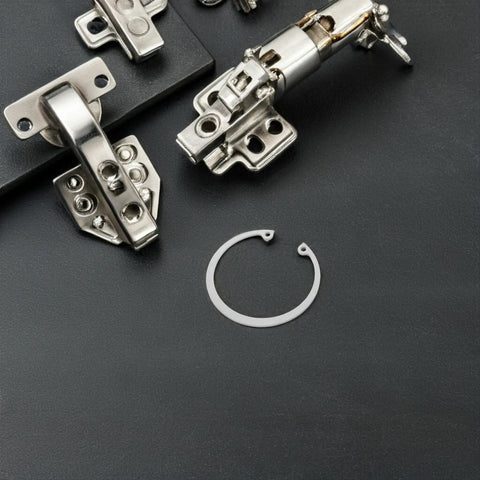 C Shaped Retaining Ring Set Five Piece Stainless Steel Snap Rings for Grooved Shafts and Studs on black surface