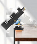 Built Tough Rotating Vise Stand Featuring Rock Solid Grip And 360 Degree Swivel at 90 degrees on a workbench.