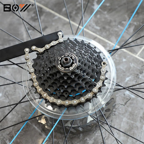 Close-up of Go To Bike Chain Whip And Sprocket Remover For Cassette And Freewheel Removal Works With 5 To 10 Speed Road And Mountain Cassettes Also Fits Single Speed With 3 32nd Inch Cog Essential Bike Maintenance Tool on a bicycle wheel showing the sprocket engagement.