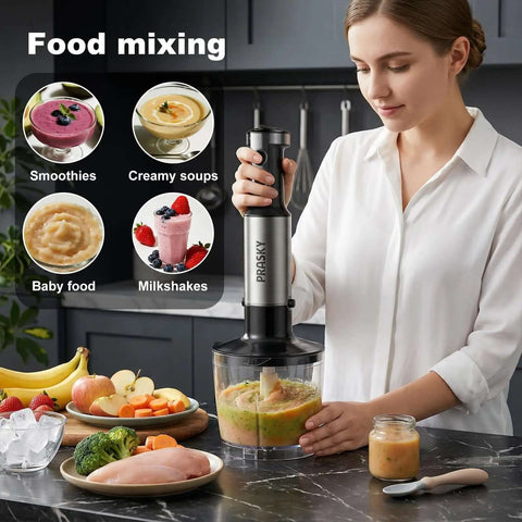 User blending ingredients with Tough As Nails Handheld Immersion Blender With Twenty Speed Settings And Turbo Boost 1200W Hand Mixer.