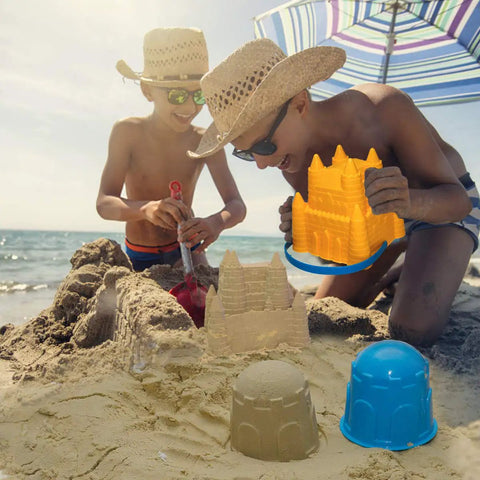 Kids playing with 7 Piece Beach Sand Toys Set with buckets, shovels, rakes, and castle sand molds at the beach. Durable plastic.