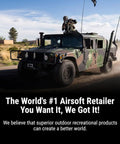 Military vehicle driving on a dirt road for Scar L Licensed Full Size Spring Powered Airsoft Rifle with Manual Cocking