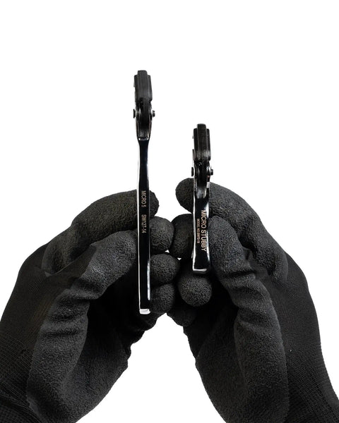 Compact Self Adjusting Pipe Vise With Sweet Ratchet Action And Nifty Contoured Grip For Tight Spots showing two different sizes held in gloved hands.