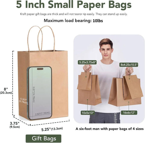 Brown Kraft Gift Bags With Handles 5.25x3.75x8 Inches 20 Pack shown with size comparison to a smartphone and person holding bags