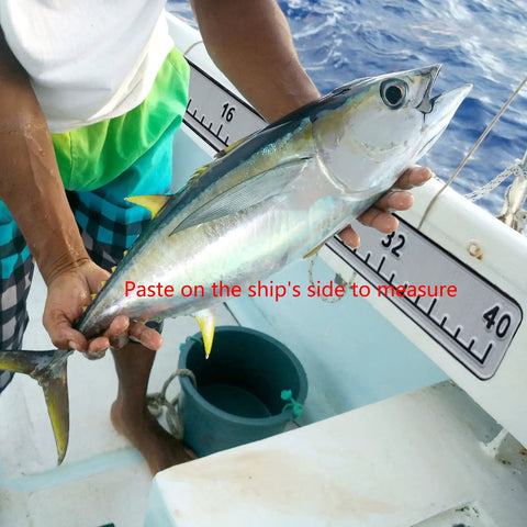 Person measuring fish on boat using 40 Inch EVA Foam Fish Ruler With Self Adhesive Backing For Boats And Kayaks, Big Readable Numbers, Quick Visual Fish Length Estimator For Fishing, Coolers, Yachts, Boating Accessories, Lightweight Waterproof.