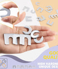 Universal Auto Body Shim Kit With Zinc Plated Shims In Three Eighths And One Half Inch Sizes, held in hand, close-up view.