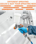 Kickstart Your Garage Refresh With This Top Shelf HVLP Spray Paint Gun Kit with 1.4mm tip in hand, showcasing spray operation.