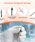 1ml U-100 Syringe With Needle 31G 5/16 Inch 8mm Pack of 30 Sterile, Individually Wrapped, LeakProof for Precise Dosing and Tiny Dose Injections, Great for Home Health Care and Medical Labs, close-up of syringe needle and gloved hand