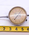 Dial Test Indicator 0 to 2.5 Inch Range With.001 Inch Graduation For Precise Alignment And Tramming In Metalworking And Shop Setups Pro Grade Gauge Tool For Fine Measurements Model NS2364CQ5 with tape measure