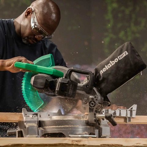 Person using Cordless Miter Saw Kit With 10-Inch Blade, 18V and 36V MultiVolt Battery And Charger, 3,800 RPM Beast, in action