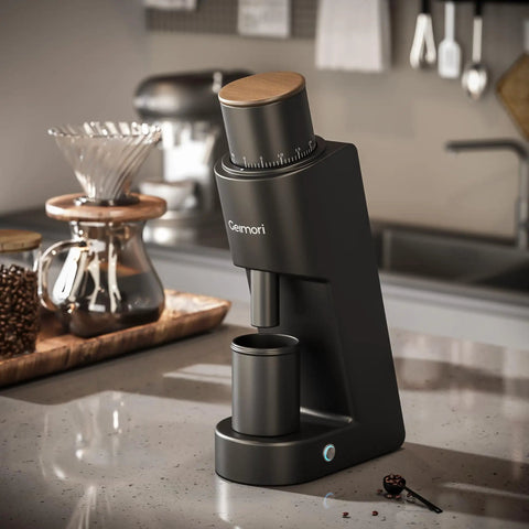 Heavy Duty Single Dose Coffee Grinder With Six Conical Burrs And Stepless Dial Delivers Hella Fine Ground Beans For Espresso Drip French Press Or Cold Brew Keeps Rock Solid Fresh on a modern kitchen counter.