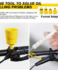 Hydraulic Brake Bleed Kit For Shimano Tektro Magura And Other Mineral Oil Brakes Includes 120ml Pro Grade Fluid Easy Bleed Tool For Road And MTB in use with yellow funnel and syringe on bike handlebar.