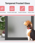 Dog looking through 32 By 80 Inch Frosted Glass Slab Door With Sleek 1 Lite Glass, French Interior Style, Pre-Assembled Solid Wood Barn Door, Black Pre-Finished Surface For Living Room, Pantry, Laundry, Closet Or Bathroom, Hardware Not Included.