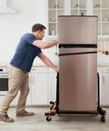 Man using Anderson Dolly Adjustable Heavy Duty Moving System, 1600 Lb Capacity, to move a refrigerator in a kitchen.