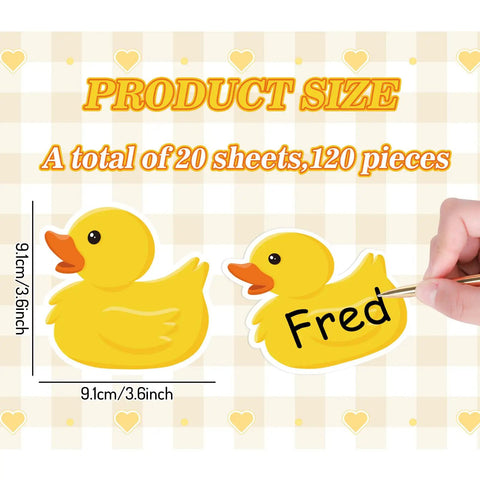 Yellow Rubber Duck Name Tag Stickers 120 Pcs Set For Classroom Decor, showing size 9.1cm with a hand writing on a duck sticker