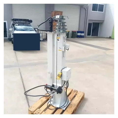 Electric Hydraulic Telescopic Mast Aluminum Push Up Antenna Pole on a wooden pallet ready for field ops and camera setup.