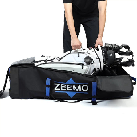 Person placing golf clubs into full open golf club travel case with wheels airline approved protective cover for cart bags.