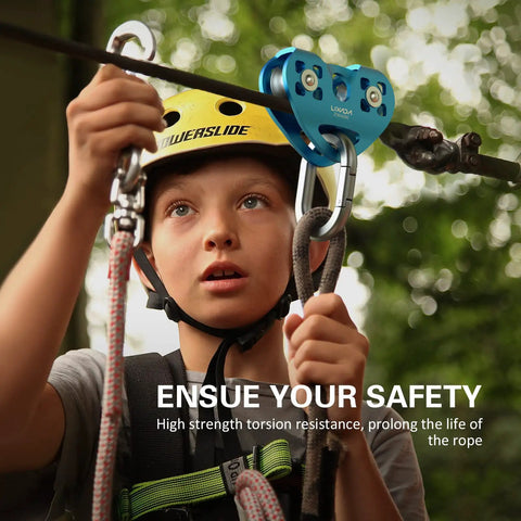 Child securing a Beefy Built Tough Zip Line Pulley Tandem Speed Double Pulley 30KN 6700LBS Breaking Strength on a zip line cable