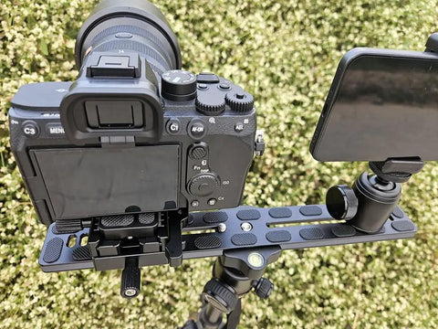Universal 300mm Lengthened Quick Release Plate Slide Rail With D Ring Screw, tripod mounted, compatible with DSLR camera and phone.