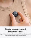 Person attaching Wireless Mic Air Transmitter For Vlog And Streaming, Ultralight 7.9g, Noise Cancelling Microphone on shirt