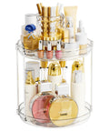 Totally Slick No Hassle 360 Spin Vanity Organizer Two Tier Clear Acrylic Rotating Storage For Perfume And Lotion Lazy Susan Beauty Stand, filled with cosmetics and skincare items.