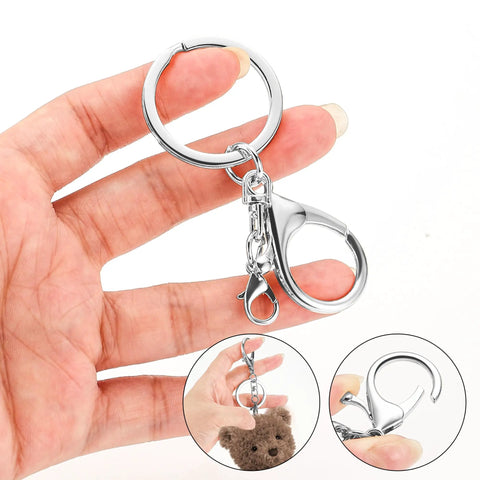 Top Shelf Zinc Alloy Lobster Clasps And Keyrings 10 Pack Badass Heavy Duty Keychain Kit showing keyring in hand with lobster clasp.