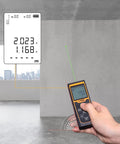 Heavy Duty Laser Distance Meter Featuring Slick Green Beams And Up To 262 Foot Range Rechargeable Battery With Crisp Lcd Readout Spot On Two Millimeter Accuracy For Hardworking Tradesmen displaying measurement on screen.