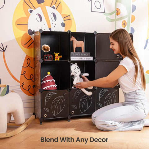 Woman organizing toys in a 9 Cube Closet Organizer With Doors Portable Modular Storage Shelves For Clothes Books Toys Black Cube Cabinet in a child's room.