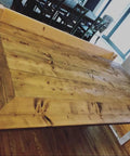 Premium Oil Based Penetrating Interior Wood Stain With Low Voc Levels For A Dang Good Natural Wood Look That Glides On Easy And Enhances Real Grain Texture In A Handy Half Pint Can applied on a rustic wooden table surface.