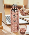 Copper Water Bottle 800ml Insulated Travel Cup With Anti Slip Grip on desk with laptop