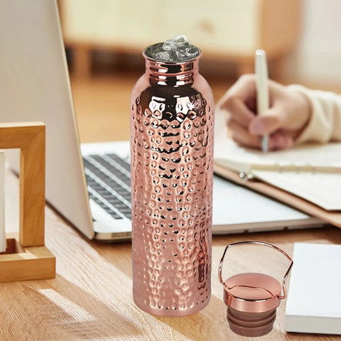 Copper Water Bottle 800ml Insulated Travel Cup With Anti Slip Grip on desk with laptop