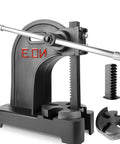 Three Ton Arbor Press Cut From Solid Cast Iron With Twelve Inch Stroke, featuring a sturdy handle and removable dies.