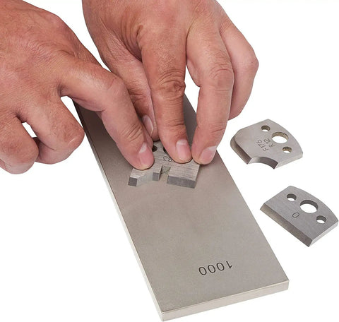 Pro Grade Diamond Whetstone Honing And Polishing Kit For Sharpening Router Bits Chisels Knives And Planer Blades Monocrystalline Diamond For Fast Clean Stock Removal And Precision Edge Sharpening being used on 1000 grit surface