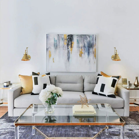 Living room with sofa and Gold Brushed Swing Arm Wall Sconces With Orange Cord Plug In Or Hardwired Adjustable Lighting Fixture