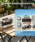 DIY Soldering Practice Kit And Electronic Speaker Build Project components on table, showing transparent acrylic shell and parts.