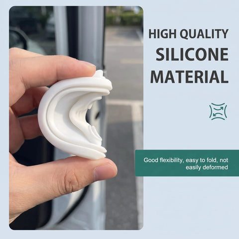 Stop The Door Clank Forever With These Heavy Duty White Silicone Door Latch Covers 4 Pack showing silicone latch cover in hand.