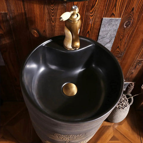 Top Shelf Handmade Vessel Sink With Faucet And Drain Pre Drilled Installation Hole Slick Modern Basin Featuring Overflow Guard, black ceramic bowl with gold faucet.