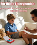 Adult aiding boy with knee injury using 135 Piece Hard Case First Aid Kit For Home Car Travel Camping Hiking Truck Sports Office And Outdoor Emergencies On The Go With Latex Free Bandages Wipes Gloves Tourniquet Tweezers And More
