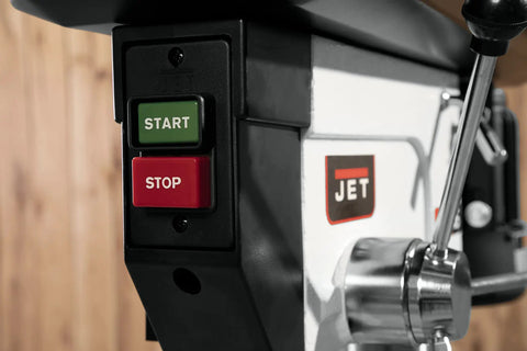 Control panel of 17 Inch Floor Drill Press With 16 Speed Options And 3/4 Horsepower Motor showing start and stop buttons.