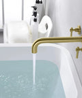 Wall Mounted Tub Filler Faucet In Brushed Gold With Solid Brass Construction And Brass Rough In Valve Set