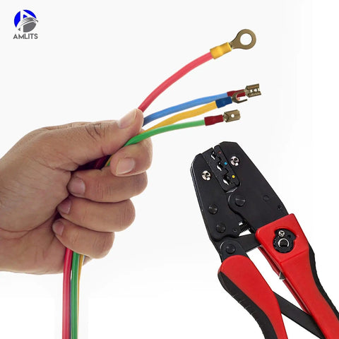 Hand holding wires with a crimping tool and 300 Piece Insulated Wire Terminal Kit With Butt Ring Spade And Quick Disconnect Crimp Connectors.