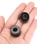 Top Shelf 10 Pack Stainless Steel Spacers 5/16 Bore 3/4 Outer Diameter Half Inch Length Heavy Duty Rod Standoffs held in hand