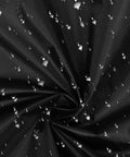 Close-up of heavy duty black fabric with water droplets, highlighting waterproof quality for Heavy Duty Outdoor EV Charger Post Cover With Kickass Waterproof And Dustproof Shell For Secure Universal Fit And All Season Protection That Just Goes The Distance On Your Electric Car.
